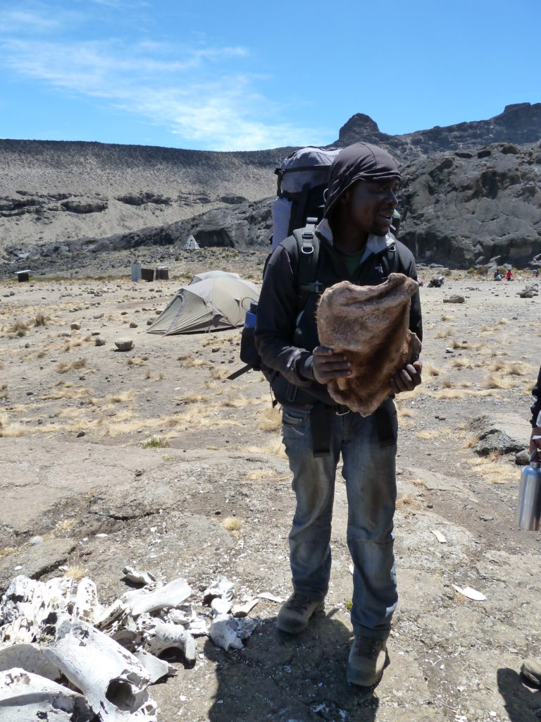 Solomon the singing Assistant Guide while we were Climbing Mt Kilimanjaro 
