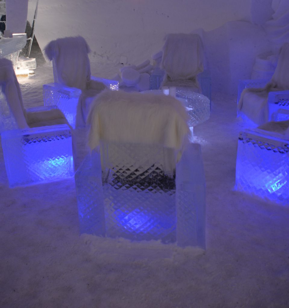 Ice lounge at the Snowhotel, Kirkenes, complete with sheep skin covers.