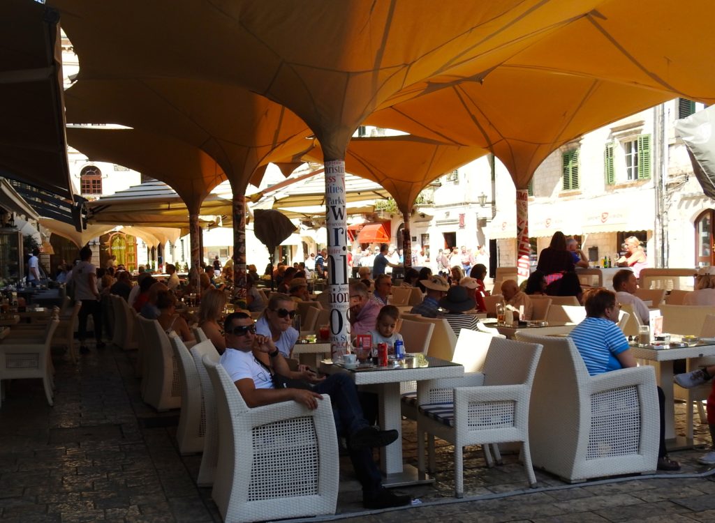 Busy cafes in the square at Kotor, Montenegro. www.gypsyat60.com