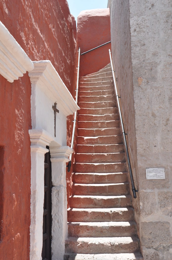 Stairway to the top of the church wall at Saint Catalina Monastery, Araquipa, Peru, South America. An amazing view of the mountains, the monastery and the city beyond awaits. www.gypsyat60.com