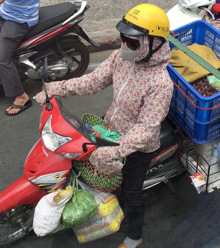 Fashionable Lady Motorbike Rider - Ho Chi Minh. Every part of her body covered (summer and winter). www.gypsyat60.com