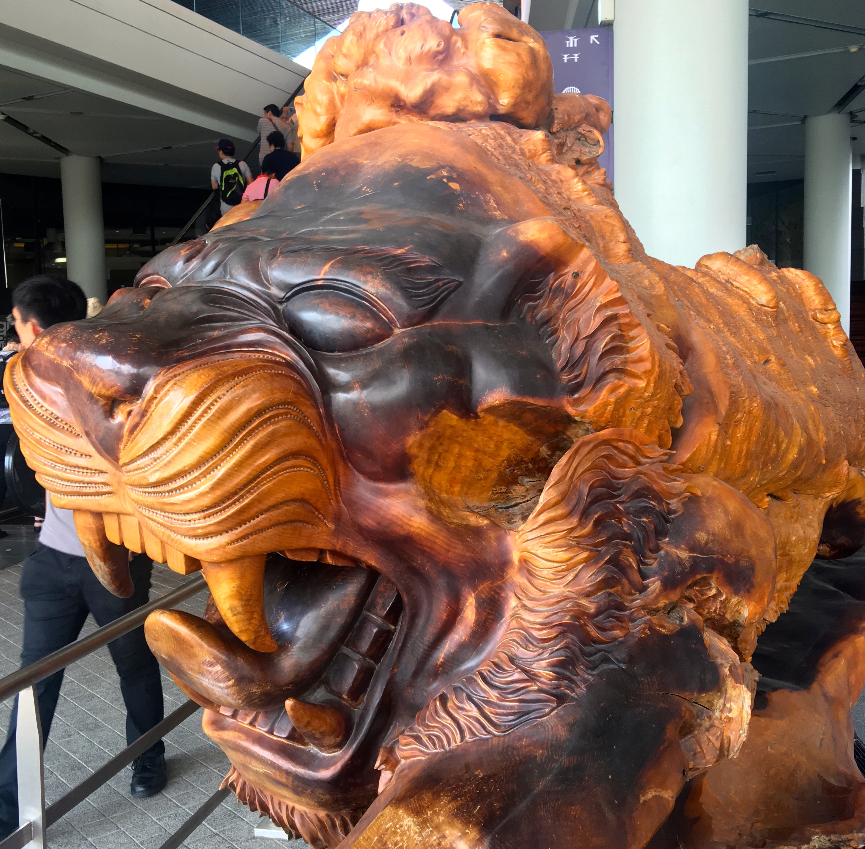 Beautiful wooden Lion King Sculpture at Gardens by the Bay, Singapore. www.gypsyat60.com