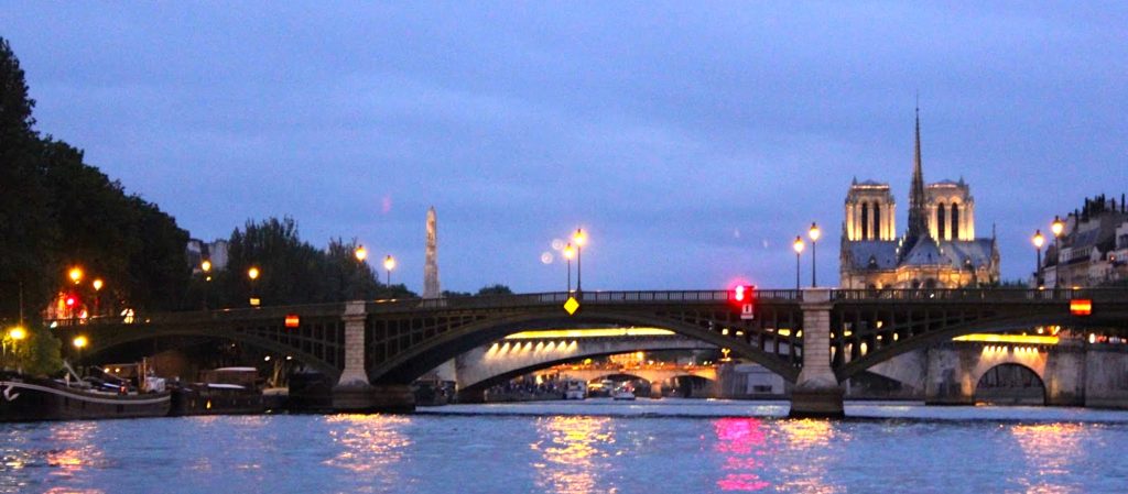 The River Seine, Paris, taken from boat level at night.