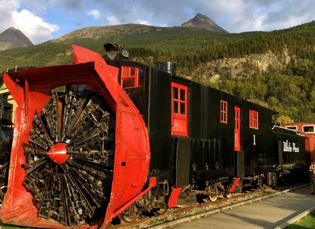 The Cooke Rotary Snowplow that had 10 ft rotary blades and was pushed by two locos to penetrate massive snowdrifts on the White Pass and Yukon Route, Scagway. www.gypsyat60.com