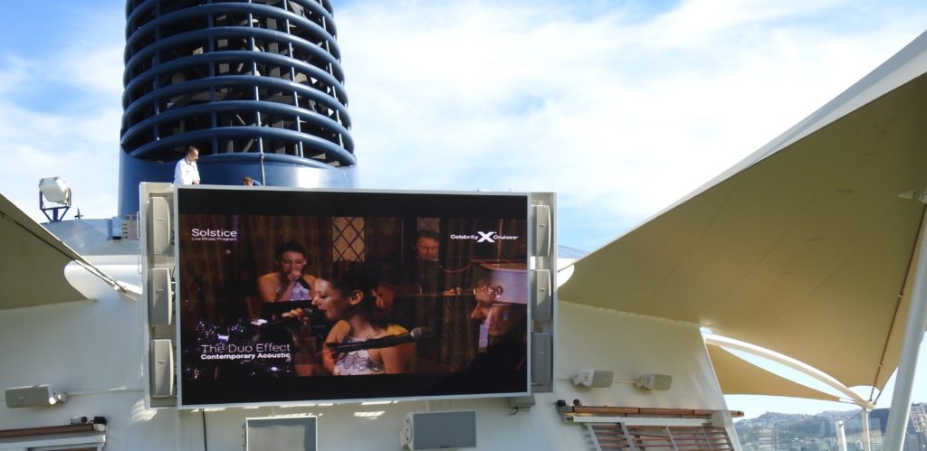 The Duo Effect(in-house band) on Screen, Celebrity Solstice. www.gypsyat60.com