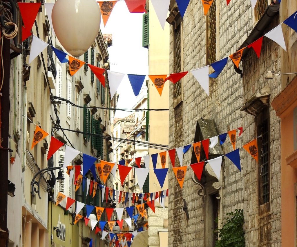 Sebinik Town, Croatia, is alive with colourful flags every September to celebrate St Michaels Day . St Michael is the patron saint of the city. www.gypsyat60.com