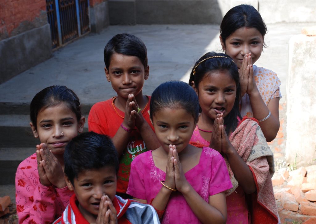 Nepalese children thanking us for building a school stage in the Kathmandu Valley. www.gypsyat60.com