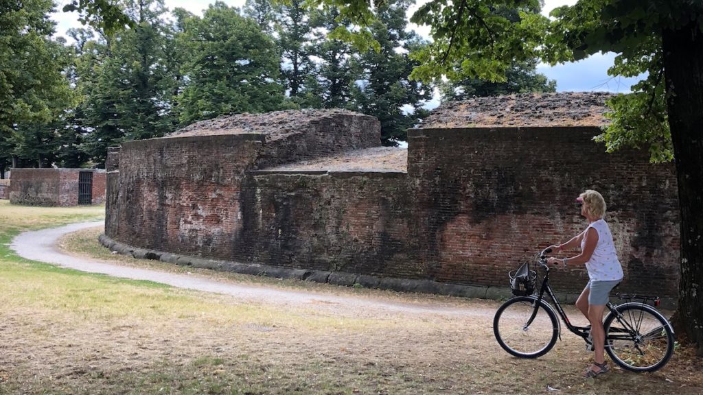 Cycling around the medieval walls of Lucca,, Tuscany Italy. www.gypsyat60.com