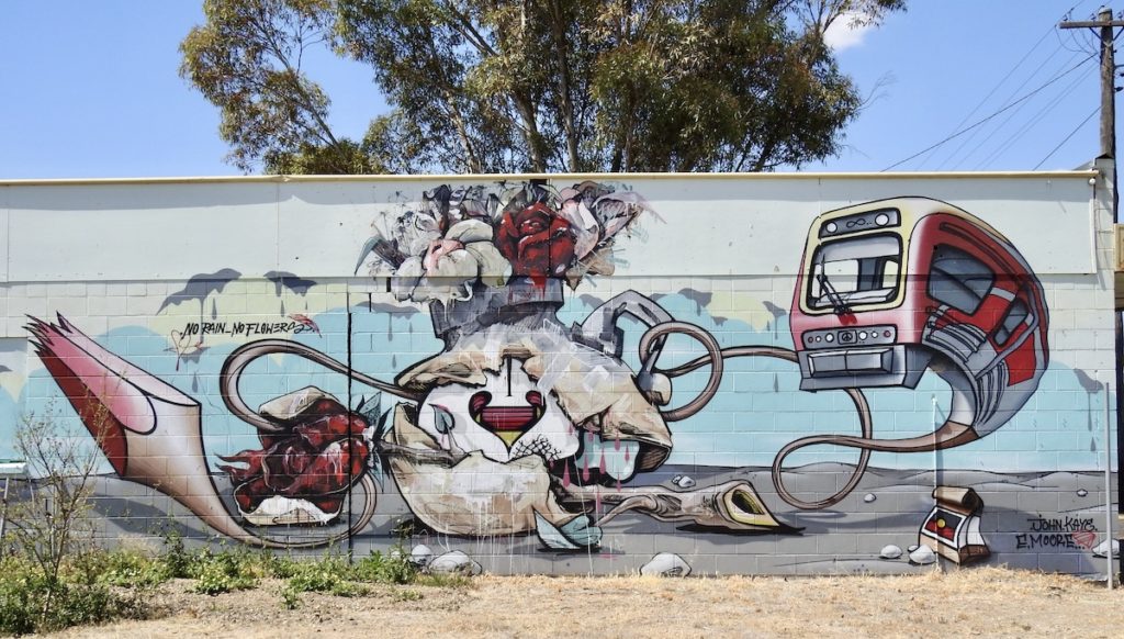 Mural at Old Killick's General Store Building, More. A surrealist artwork that was created in consultation with the Moree community. Artists - John Kaye and Emmanuel Moore. www.gypsyat60.com